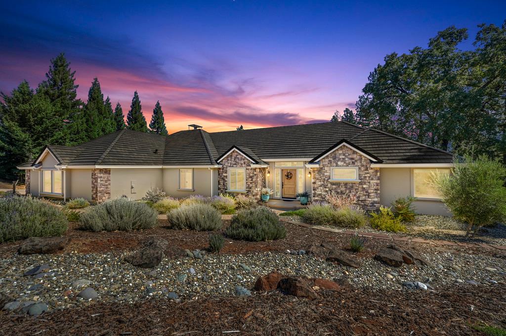 19676 Eagle Ridge Road Foresthill, CA 95631 - Photo 6 of 68 a front view of a house with a yard