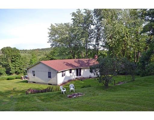130 Upper Palmer Road Monson, MA 01057 - Photo 3 of 25 a aerial view of a white house in front of a big yard with plants and large trees
