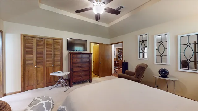 a bedroom with a bed and furniture