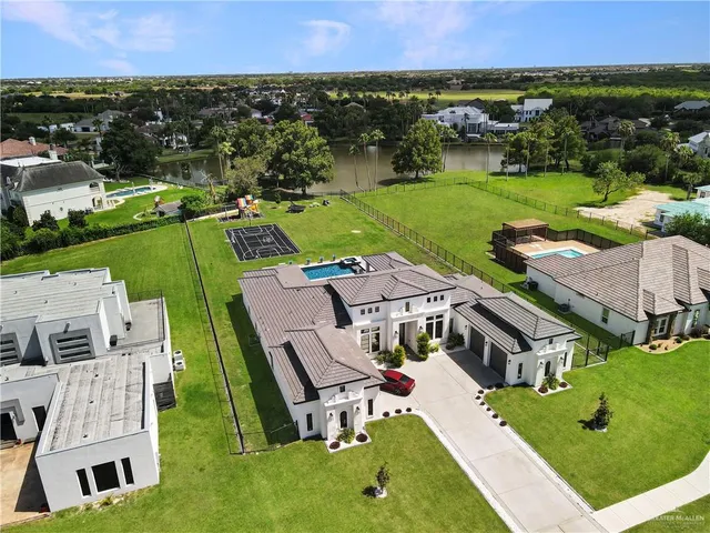 an aerial view of a house with a garden