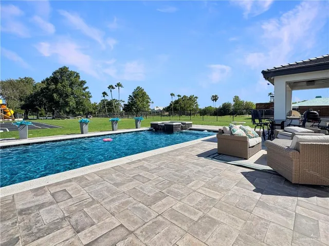 a view of a garden with an outdoor space