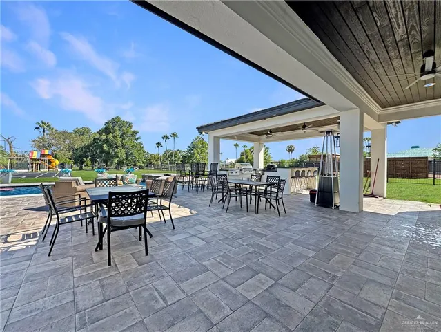 a view of a tables and chairs in patio