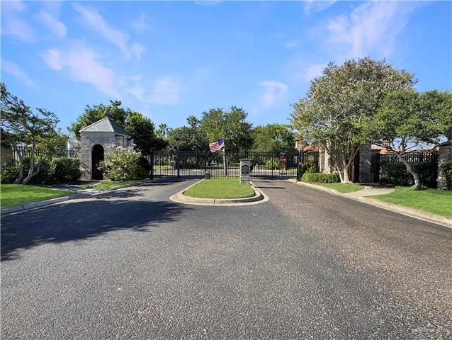 a swimming pool with outdoor seating and yard