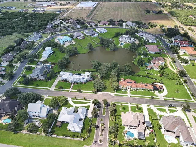 an aerial view of a house with a garden