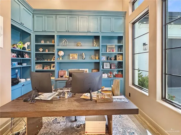 a view of a workspace with furniture