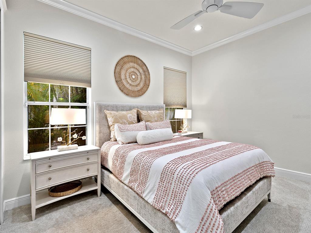 7431 Greystone Street Lakewood Ranch, FL 34202 - Photo 46 of 85 a bedroom with a bed and a window