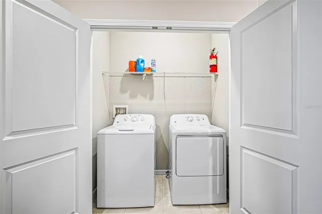 a utility room with dryer and washer