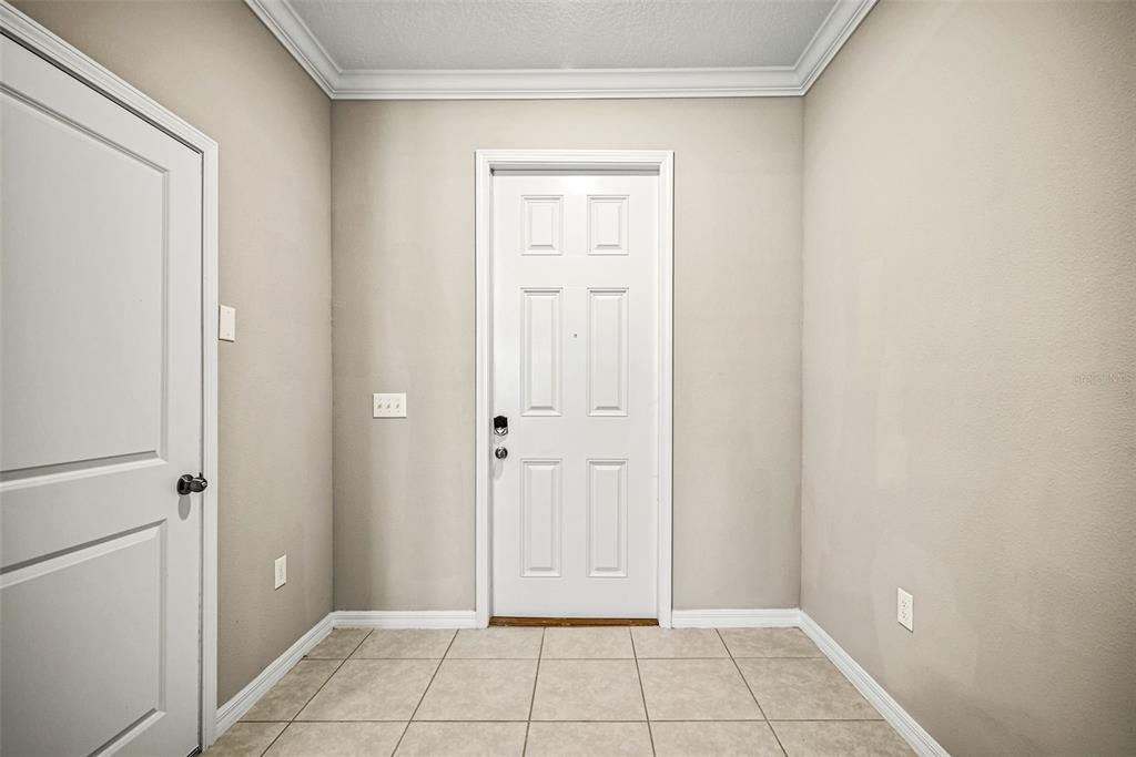 31945 Blue Passing Loop Wesley Chapel, FL 33545 - Photo 3 of 22 a view of an empty room