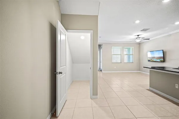 a view of a kitchen with a sink and dishwasher cabinets