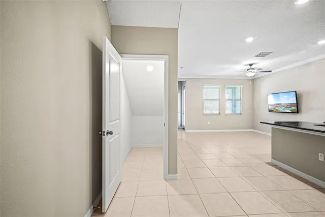 a view of a kitchen with a sink and dishwasher cabinets