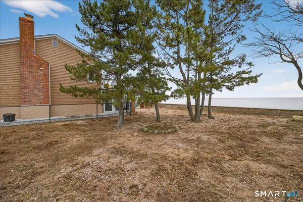 a view of a terrace with furniture and stove