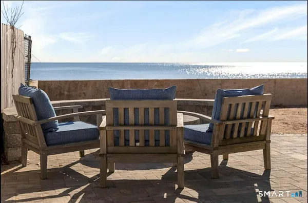 a view of a chairs and table on the terrace