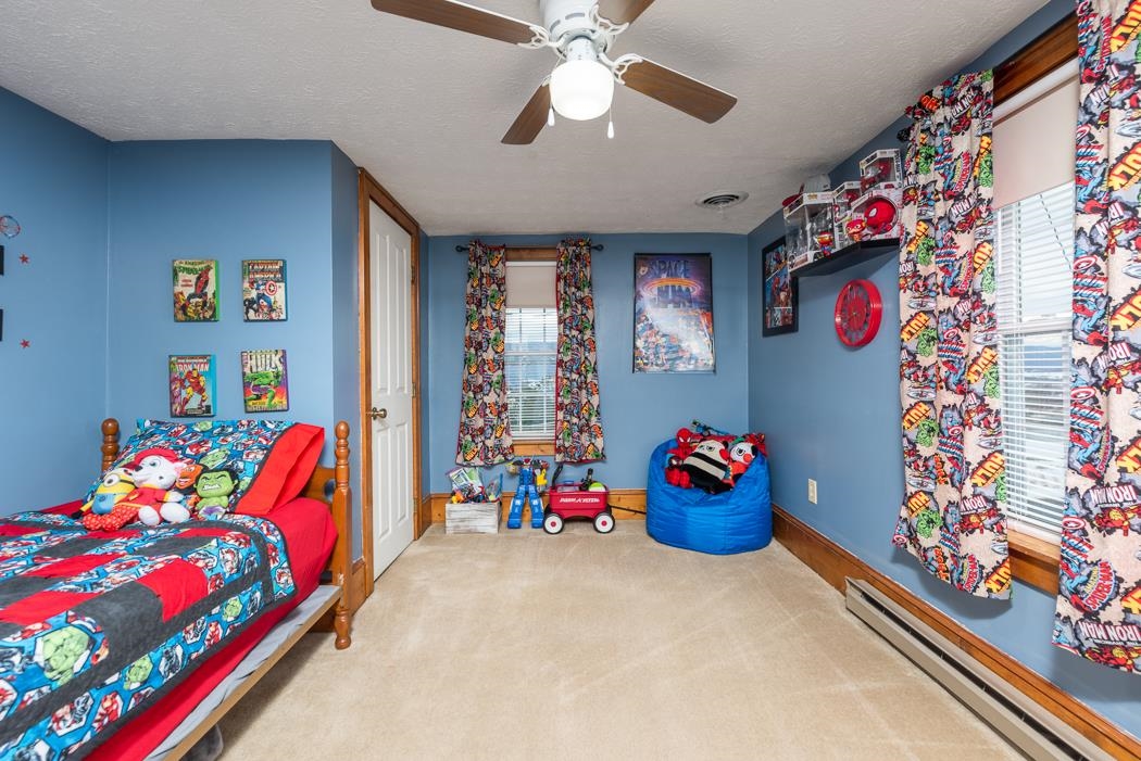588 Concord Church Road Timberville, VA 22853 - Photo 13 of 32 a bedroom with toys and dresser with toys