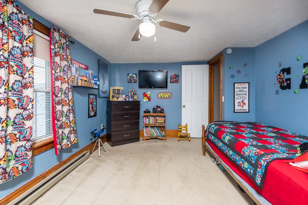 588 Concord Church Road Timberville, VA 22853 - Photo 14 of 32 a bedroom with a bed and furniture