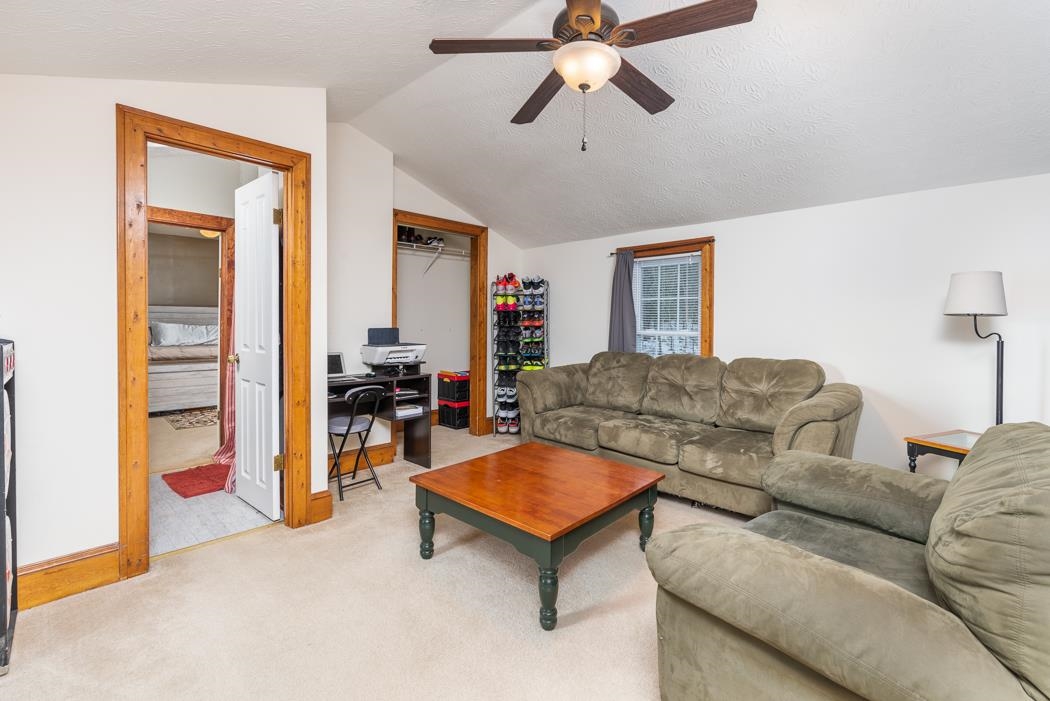 588 Concord Church Road Timberville, VA 22853 - Photo 19 of 32 a living room with furniture and a flat screen tv