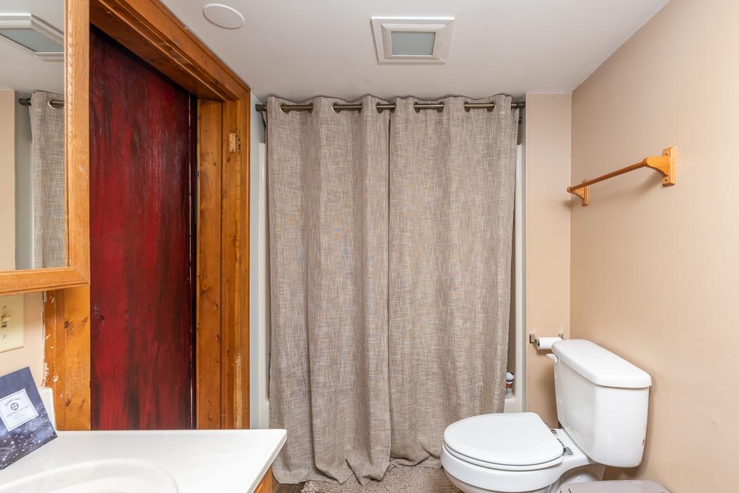 588 Concord Church Road Timberville, VA 22853 - Photo 22 of 32 a white toilet sitting next to a small yard