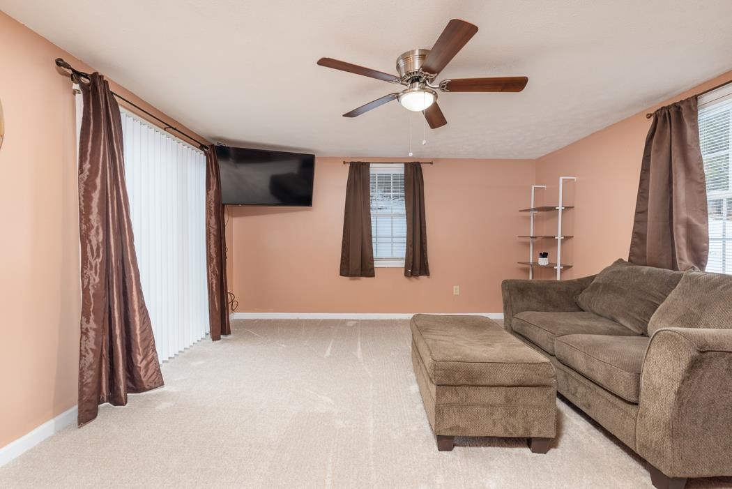 588 Concord Church Road Timberville, VA 22853 - Photo 23 of 32 a living room with furniture and a flat screen tv