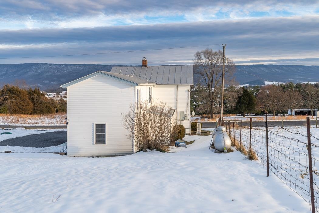 588 Concord Church Road Timberville, VA 22853 - Photo 29 of 32 a view of a terrace with a bench