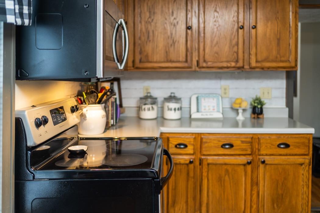 588 Concord Church Road Timberville, VA 22853 - Photo 5 of 32 a kitchen with appliances cabinets and a counter top space