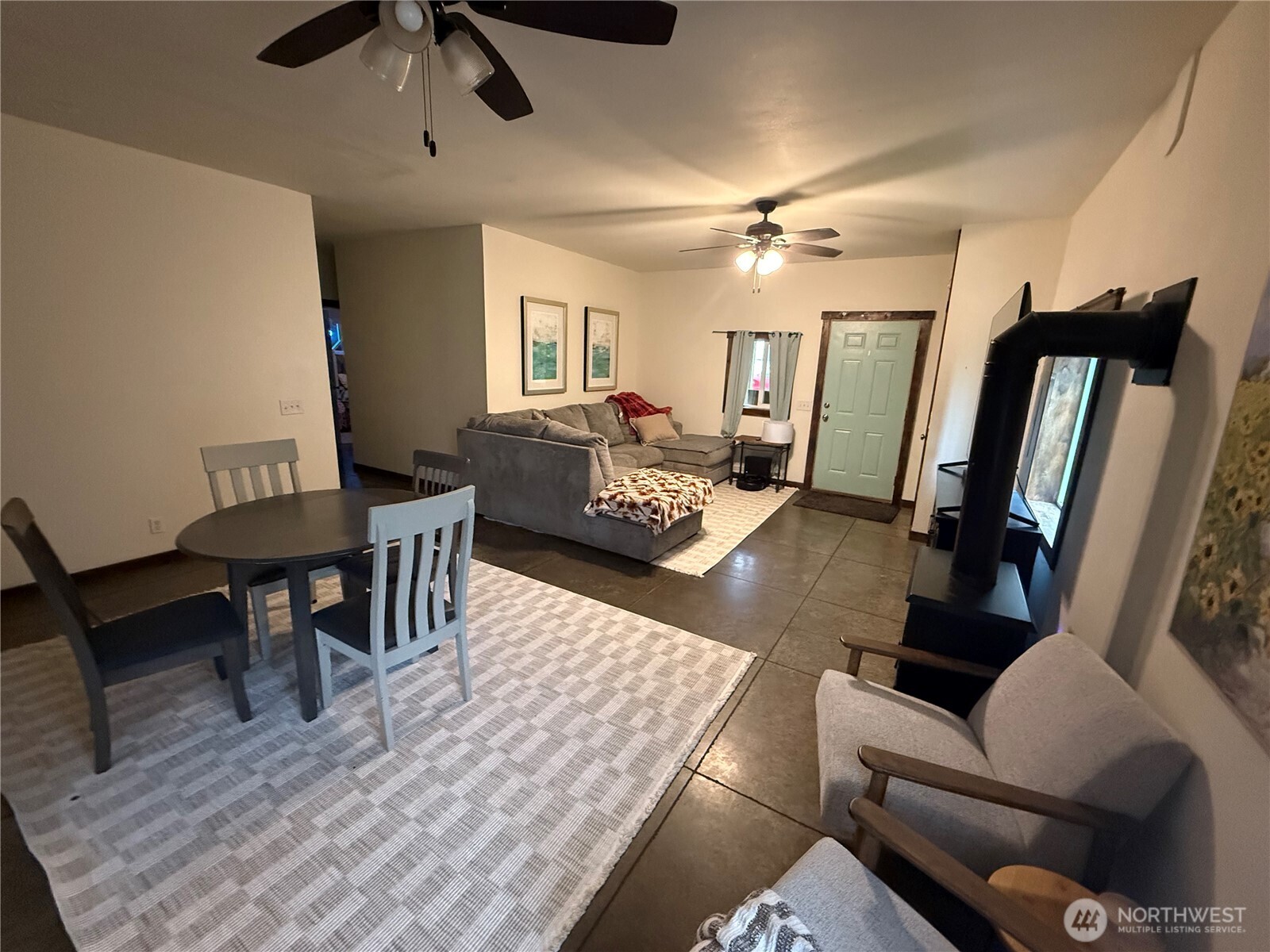 3324 Bailey Way Ferndale, WA 98248 - Photo 6 of 23 a living room with furniture and a wooden floor