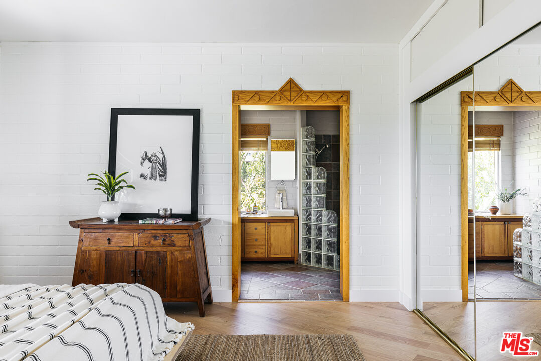 811 Montecito Drive Los Angeles, CA 90031 - Photo 12 of 25 a bedroom with a bed and a window