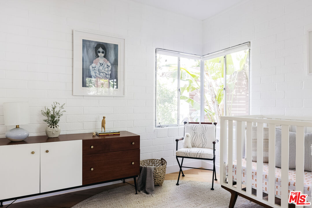 811 Montecito Drive Los Angeles, CA 90031 - Photo 15 of 25 a bedroom with a bed and a window