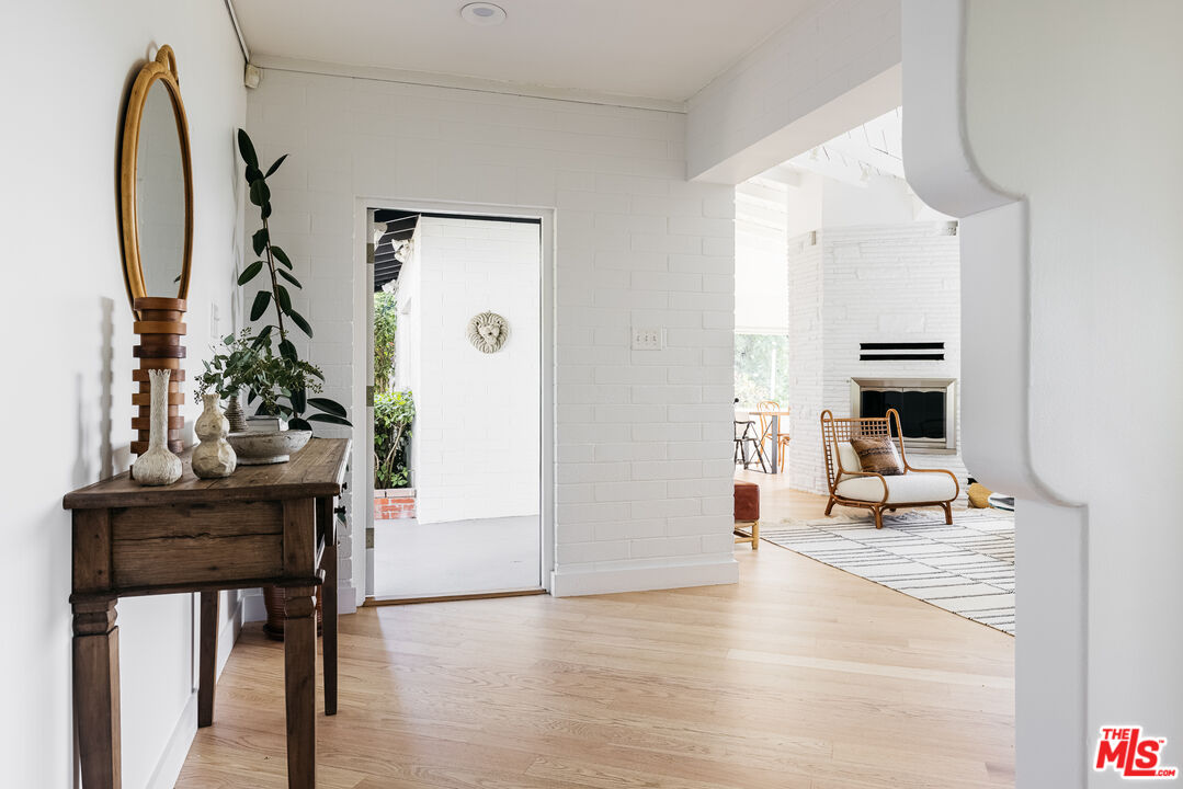 811 Montecito Drive Los Angeles, CA 90031 - Photo 5 of 25 a view of living room with furniture and wooden floor