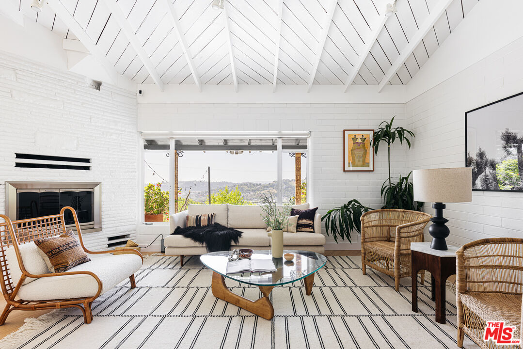 811 Montecito Drive Los Angeles, CA 90031 - Photo 6 of 25 a living room with furniture and a large window