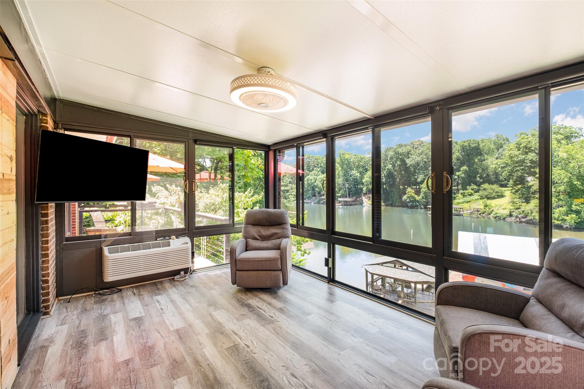 9500 Windygap Road Charlotte, NC 28278 - Photo 21 of 48 a living room with furniture and a flat screen tv