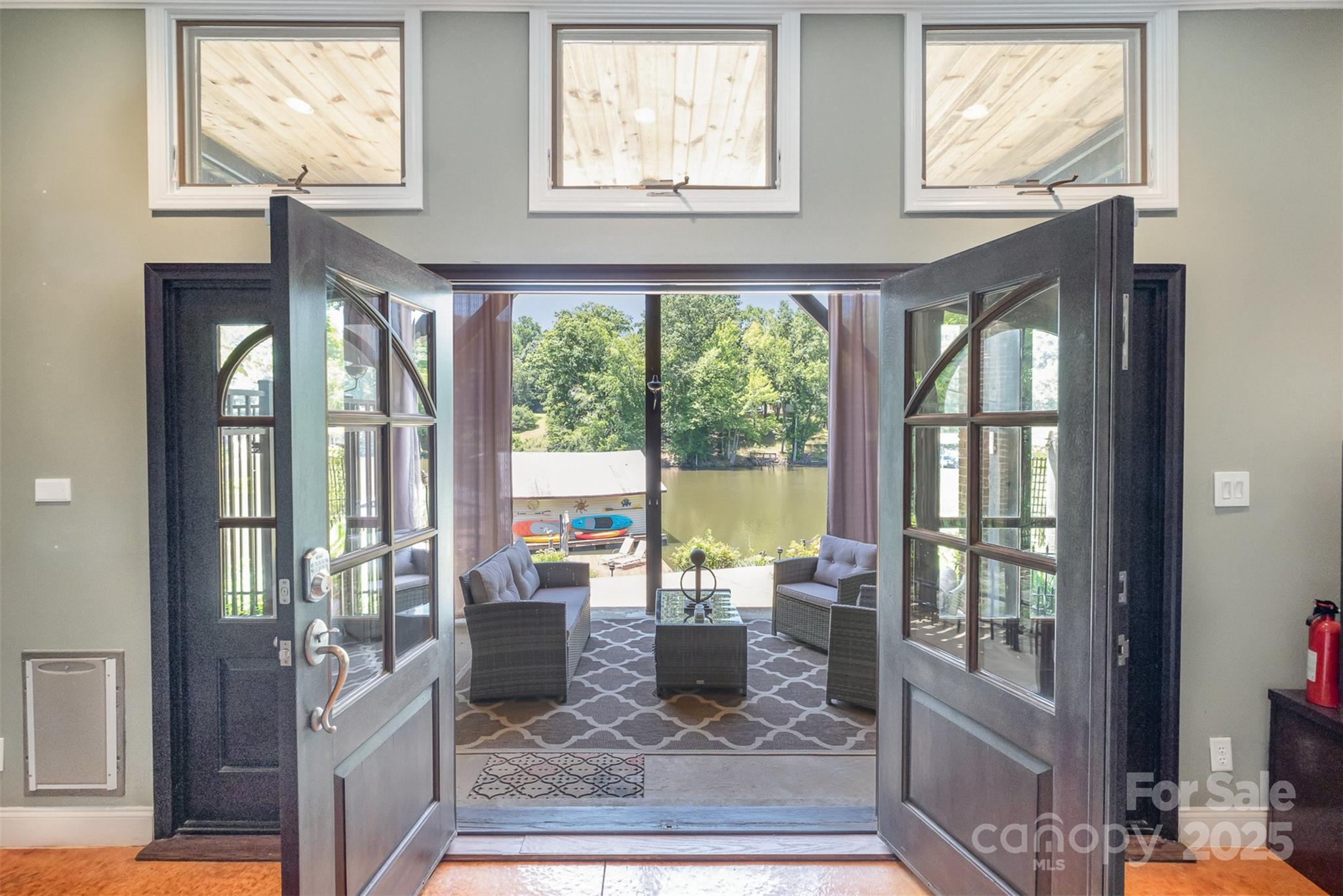 9500 Windygap Road Charlotte, NC 28278 - Photo 23 of 48 a living room with large windows