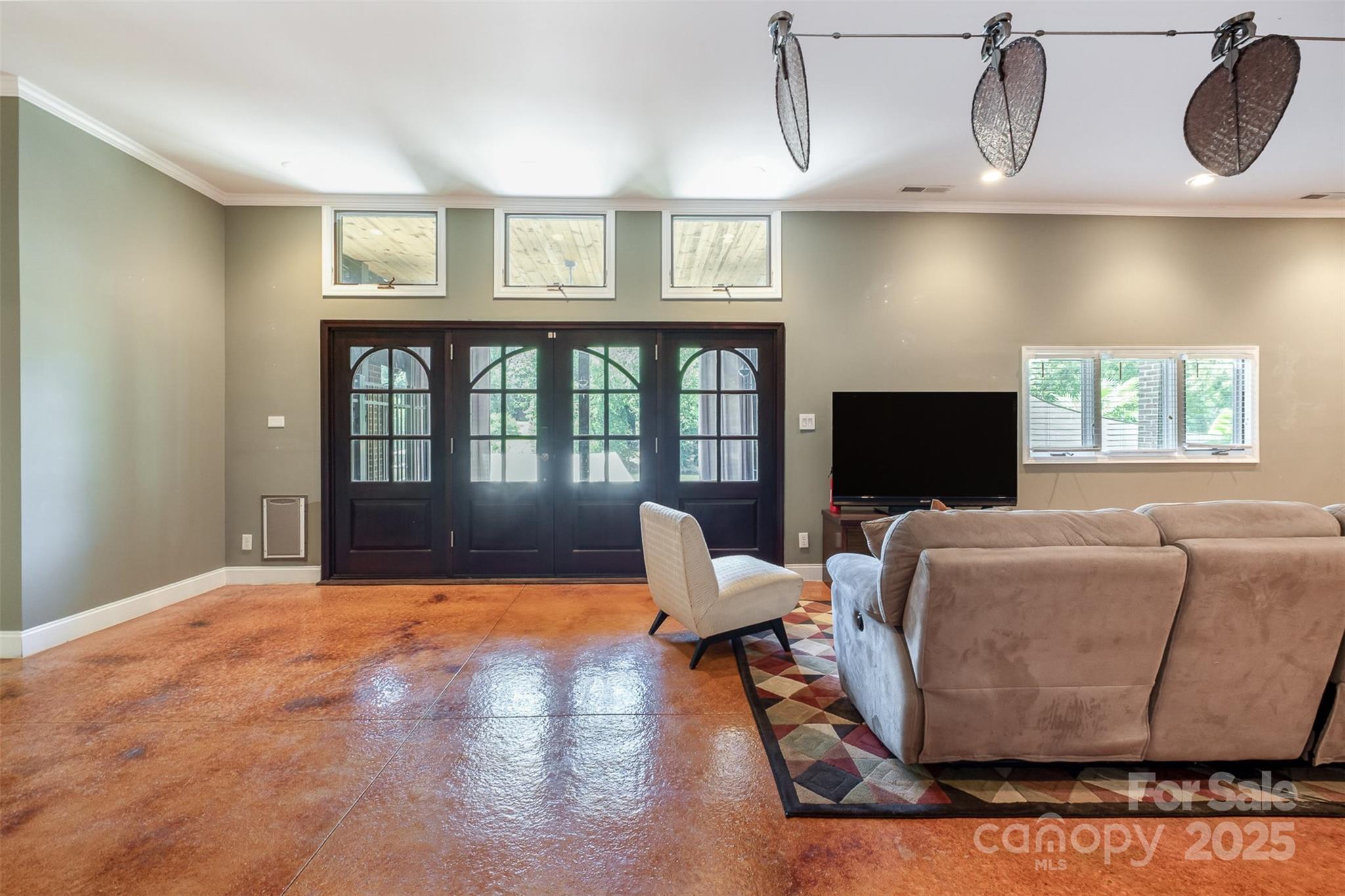 9500 Windygap Road Charlotte, NC 28278 - Photo 24 of 48 a living room with furniture wooden floor and a flat screen tv