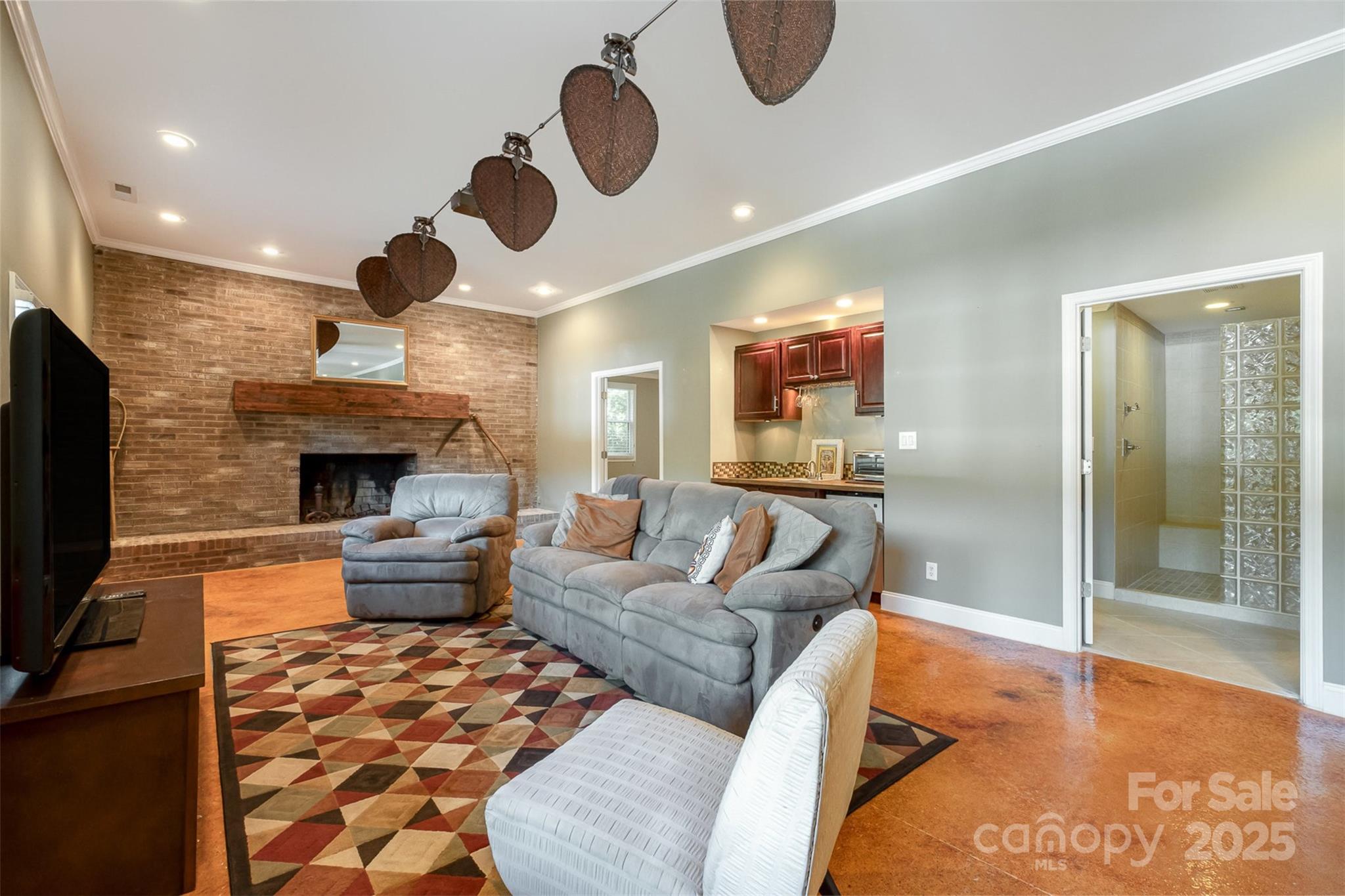 9500 Windygap Road Charlotte, NC 28278 - Photo 26 of 48 a living room with furniture and a fireplace
