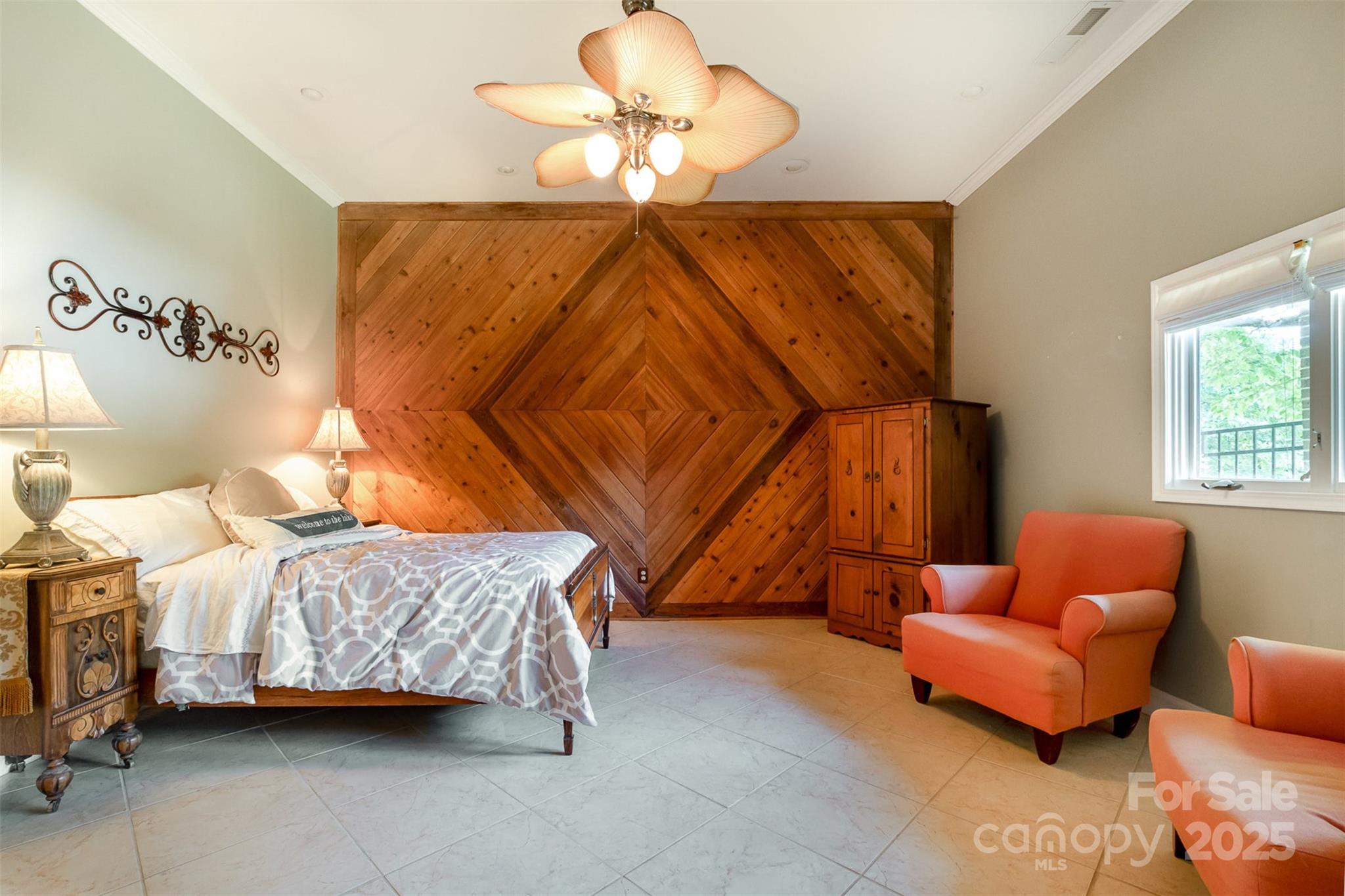 9500 Windygap Road Charlotte, NC 28278 - Photo 28 of 48 a bedroom with furniture and a chandelier