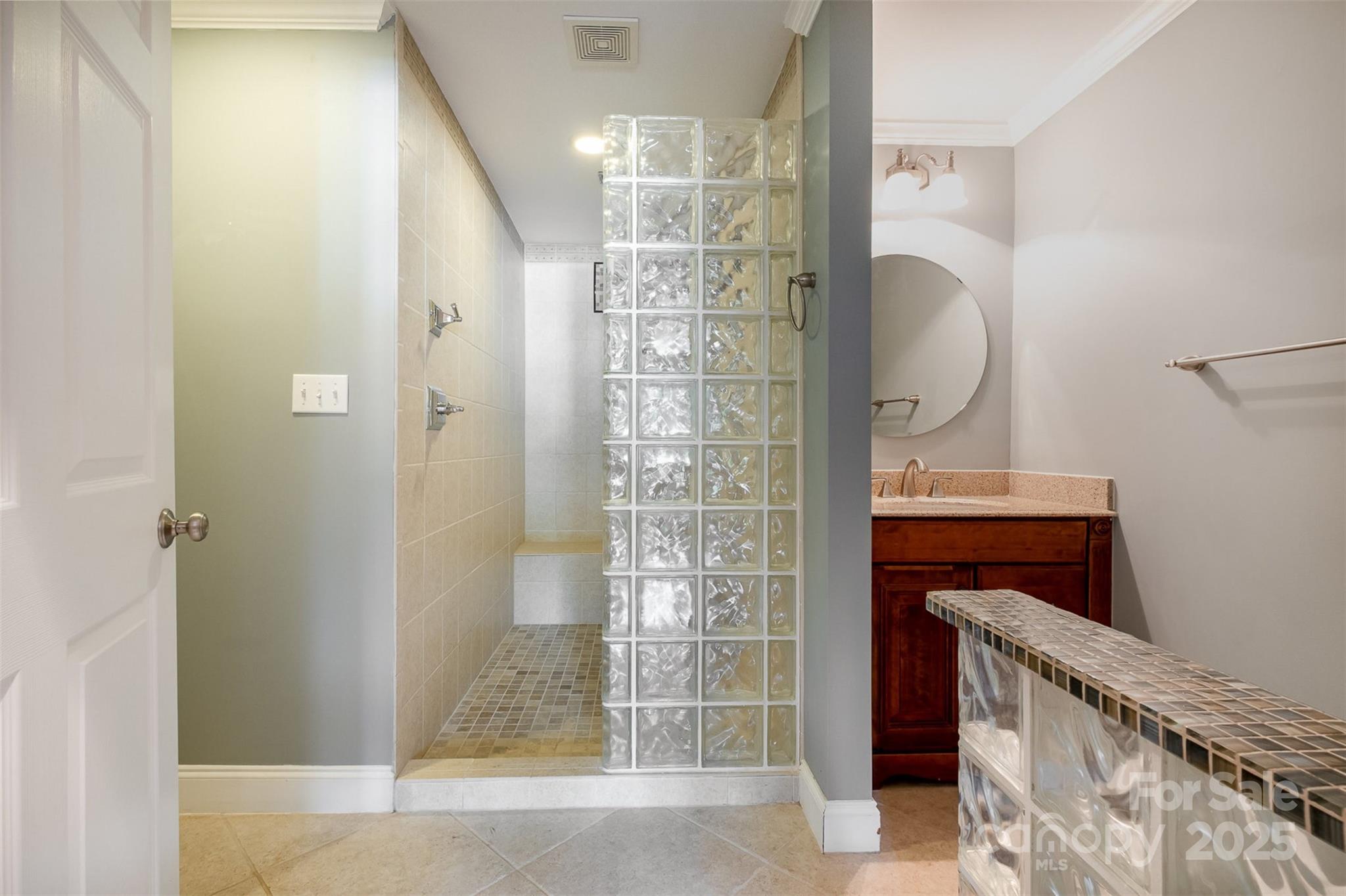 9500 Windygap Road Charlotte, NC 28278 - Photo 33 of 48 a bathroom with a mirror and a shower