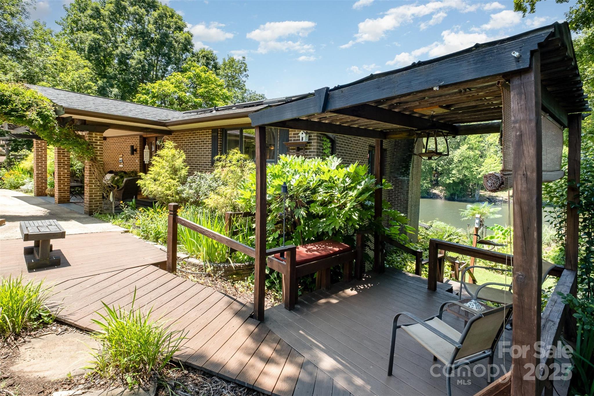 9500 Windygap Road Charlotte, NC 28278 - Photo 36 of 48 a view of a porch with furniture