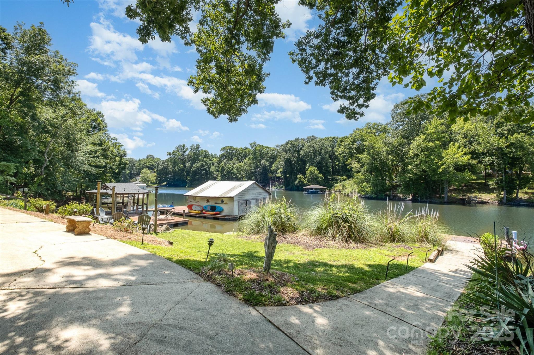 9500 Windygap Road Charlotte, NC 28278 - Photo 40 of 48 a view of a lake with a house