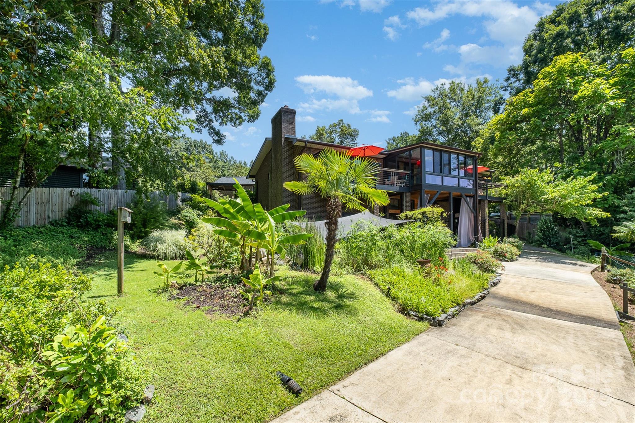 9500 Windygap Road Charlotte, NC 28278 - Photo 41 of 48 a green field with lots of trees