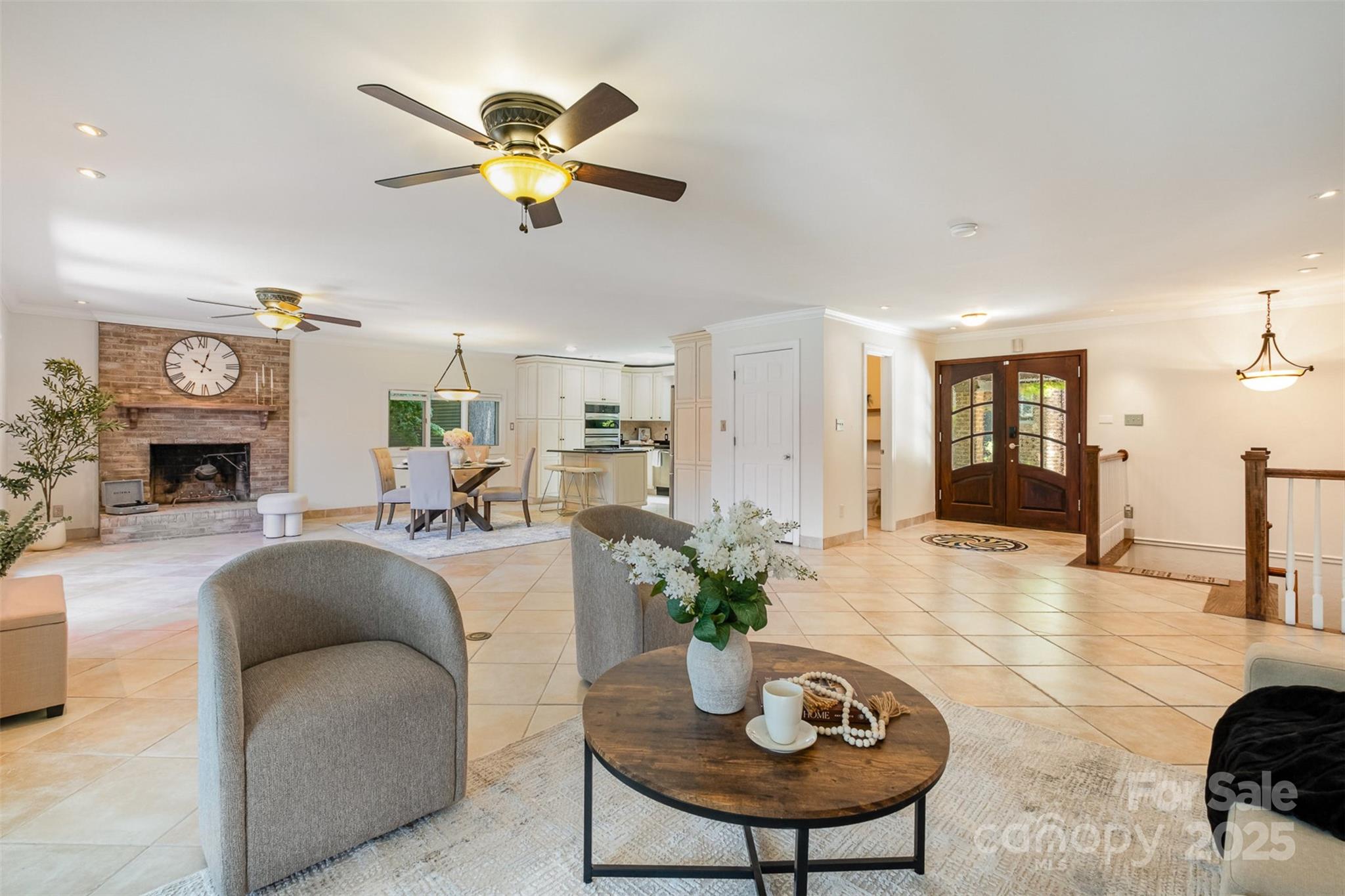 9500 Windygap Road Charlotte, NC 28278 - Photo 7 of 48 a living room with fireplace furniture and a chandelier