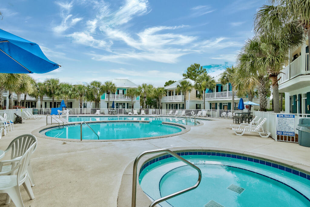 198 Somerset Bridge Road, Unit 123 Santa Rosa Beach, FL 32459 - Photo 18 of 21 a view of a swimming pool with a patio