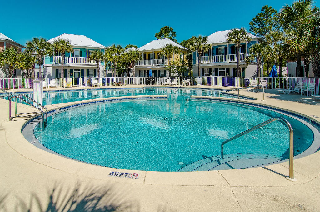 198 Somerset Bridge Road, Unit 123 Santa Rosa Beach, FL 32459 - Photo 19 of 21 a view of a swimming pool with outdoor seating