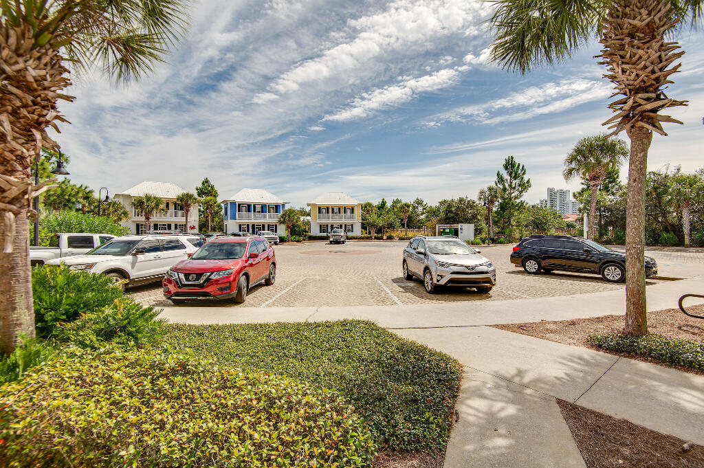 198 Somerset Bridge Road, Unit 123 Santa Rosa Beach, FL 32459 - Photo 21 of 21 a view of cars parked in front of a house