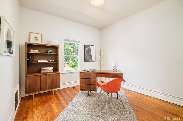 a room with furniture and window