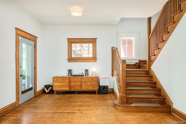 a room with a bed and a window