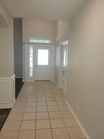 a view of an empty room with window