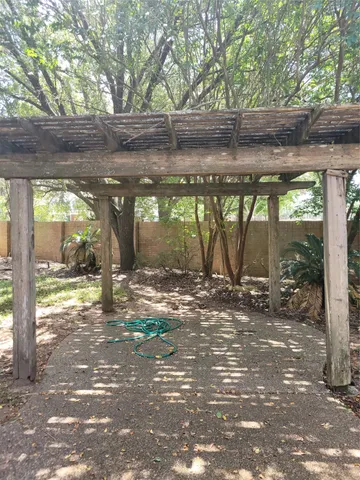 a view of a yard with an outdoor space