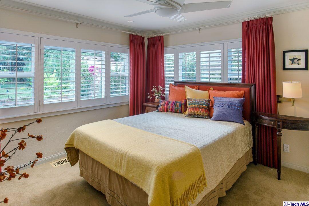 1911 Pepper Drive Altadena, CA 91001 - Photo 13 of 28 a bedroom with a bed and window
