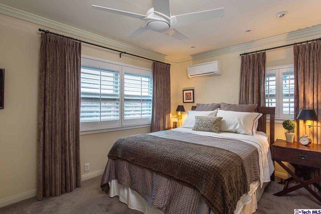 1911 Pepper Drive Altadena, CA 91001 - Photo 19 of 28 a bedroom with a bed and a window