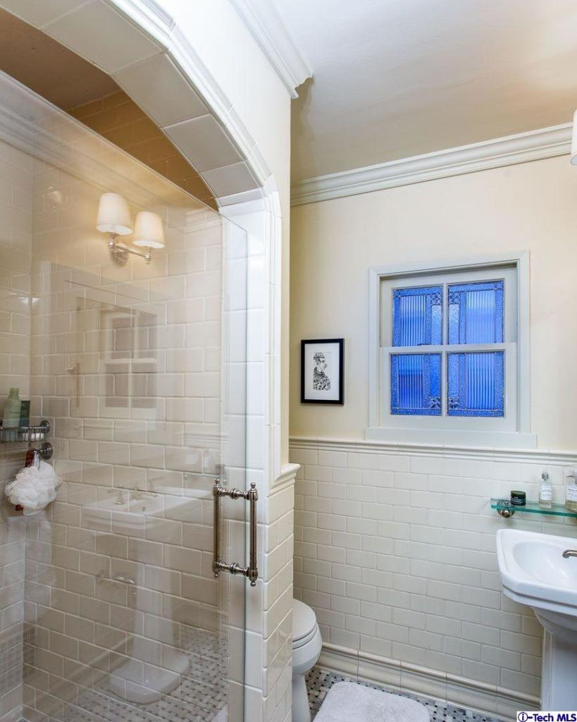 1911 Pepper Drive Altadena, CA 91001 - Photo 20 of 28 a bathroom with a toilet a sink and shower