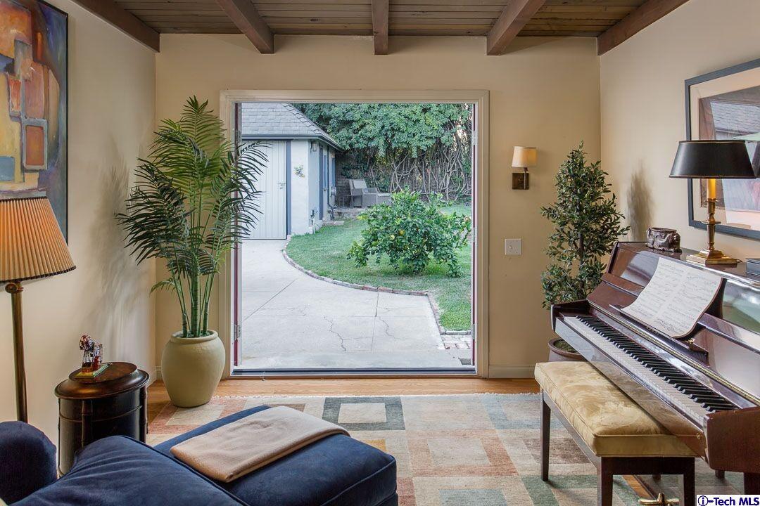 1911 Pepper Drive Altadena, CA 91001 - Photo 23 of 28 a living room with furniture and a potted plant