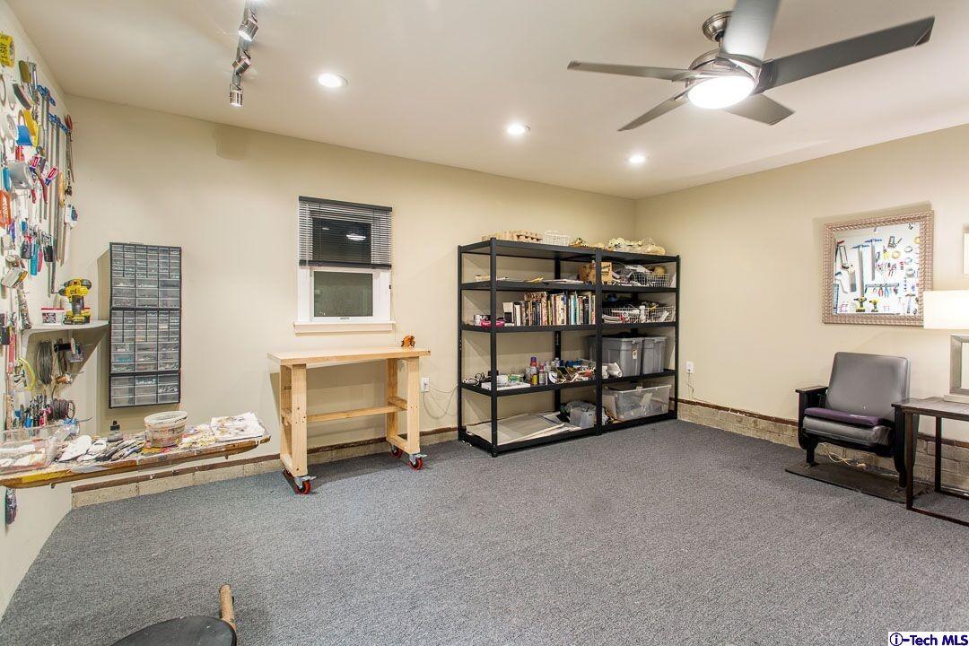 1911 Pepper Drive Altadena, CA 91001 - Photo 26 of 28 a living room with gym equipment and a window